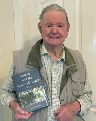 John Thompson with book John Thompson with book